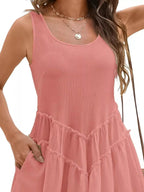 Women's sleeveless round neck mini dress with pockets, trendy dress by Trendsi, featuring a casual fit and stylish design.