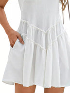 Women's sleeveless round neck mini dress with pockets, stylish and casual, by Trendsi, perfect for warm weather and everyday wear.