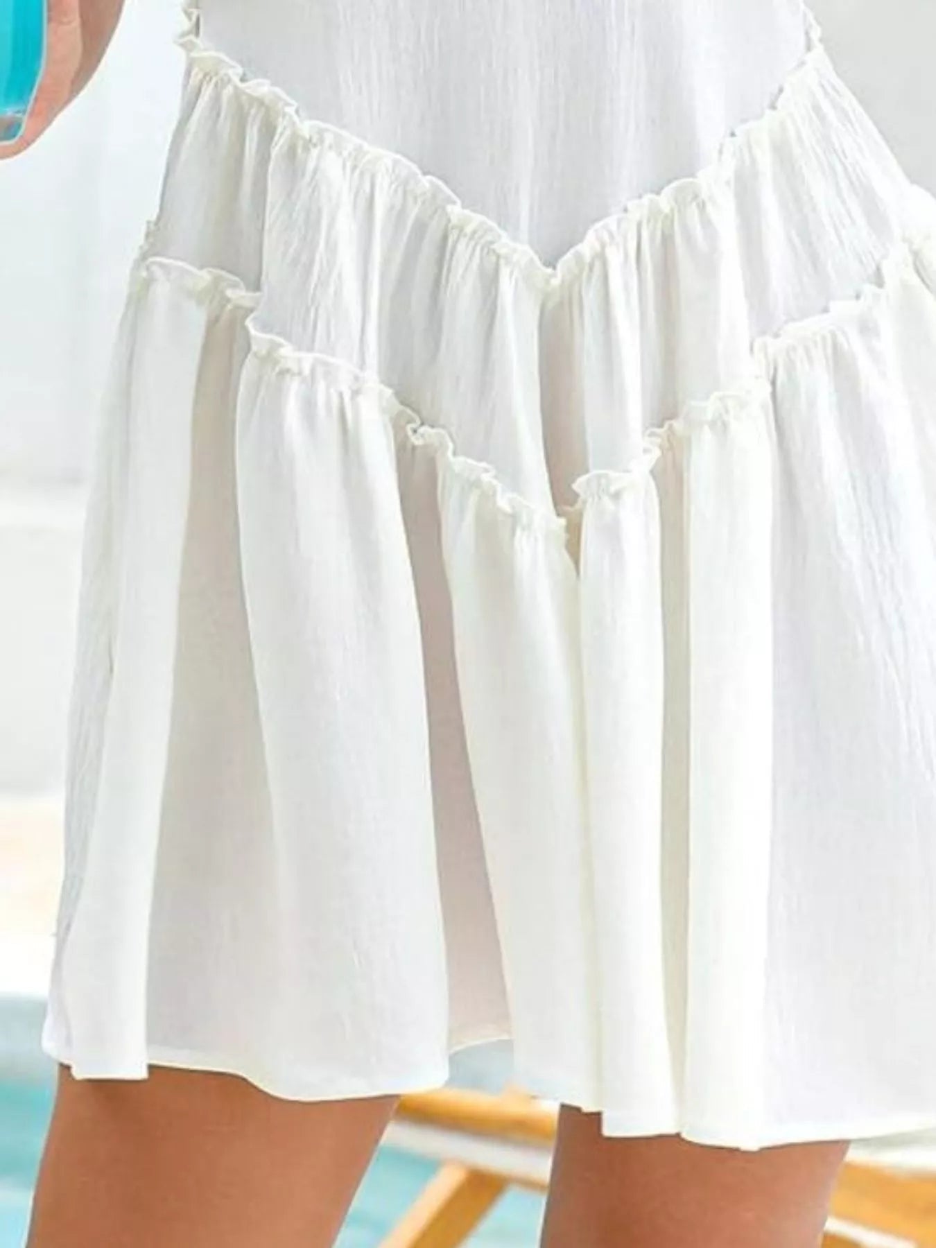 Women's sleeveless round neck mini dress with pockets by Trendsi, featuring a casual style and comfortable fit.