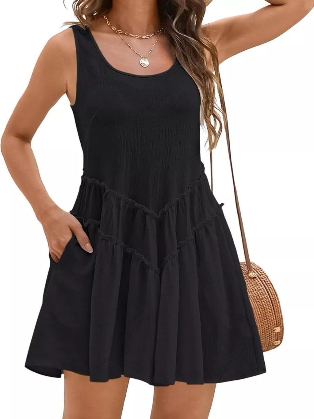 Women's sleeveless round neck mini dress with pockets, stylish Trendsi dress perfect for casual or summer wear.