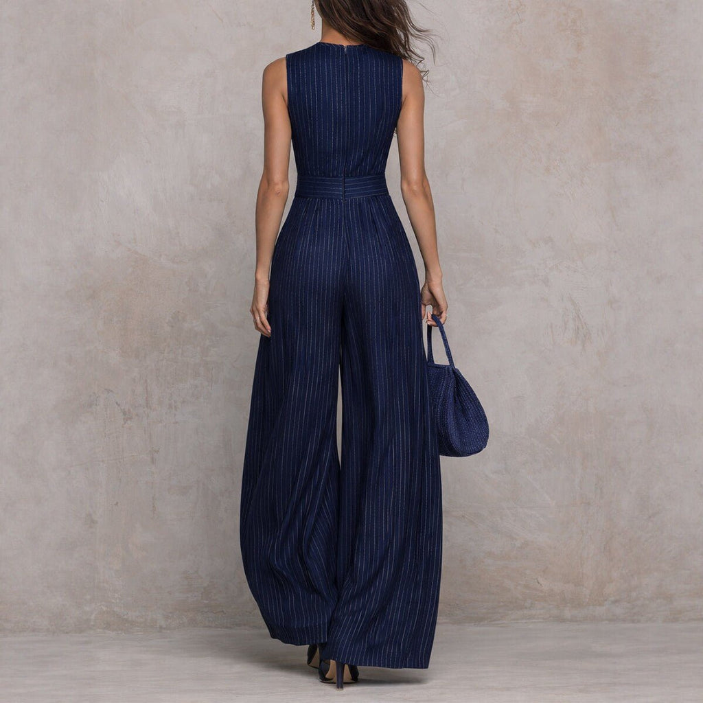 Women's sleeveless striped wide-leg jumpsuit with pockets, casualwear from Plush Fashion Hub, featuring a relaxed fit and stylish design.