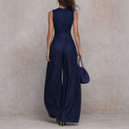 Women's sleeveless striped wide-leg jumpsuit with pockets, casualwear from Plush Fashion Hub, featuring a relaxed fit and stylish design.