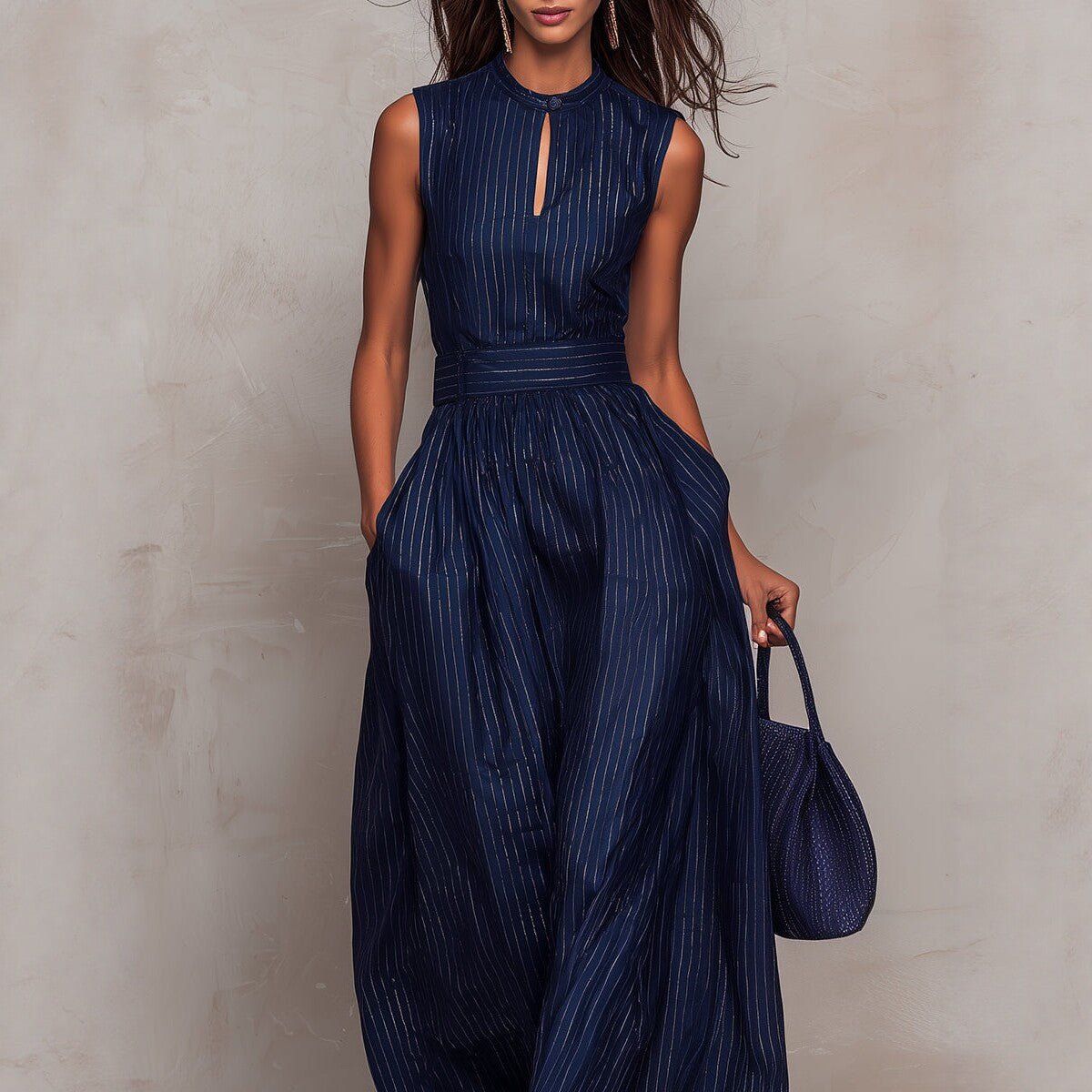 Women's sleeveless striped wide-leg jumpsuit with pockets, casualwear by Plush Fashion Hub, shown on a model.