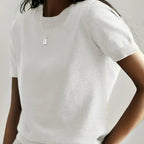 Women's soft stretch minimalist T-shirt from Plush Fashion Hub, slim fit casual top with a comfortable, everyday style.
