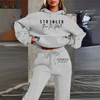 Women's solid 2-piece hoodie set with letter print and front pocket, made by Plush Fashion Hub, casual and comfortable outfit.