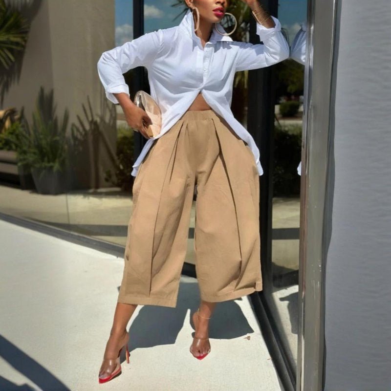 Women's solid color cotton wide-leg cropped pants in casualwear style, featuring a relaxed fit and comfortable fabric.