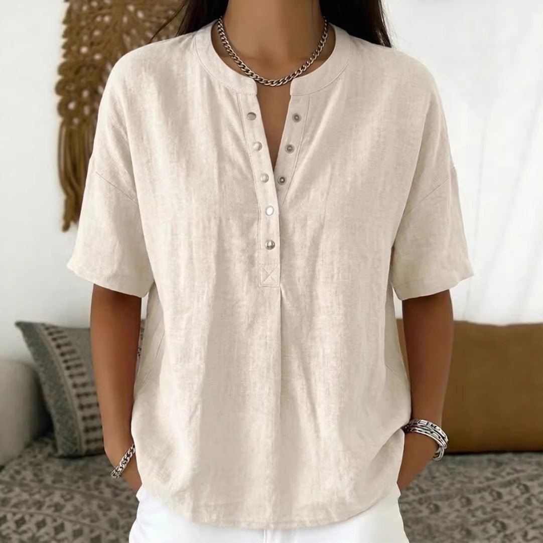 Women's solid color loose-fit short-sleeve pullover top in casualwear style by Plush Fashion Hub, displayed on a mannequin.
