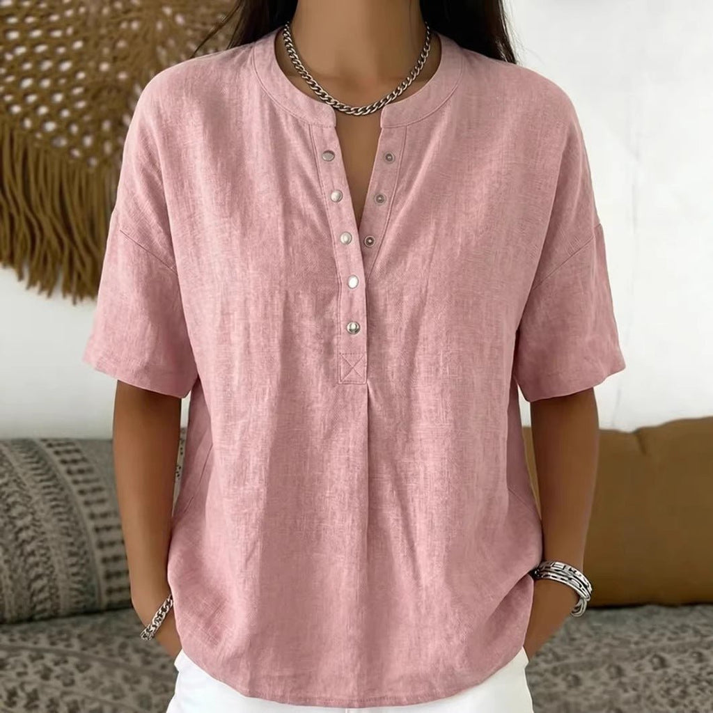 Women’s solid color loose-fit short-sleeve pullover top from Plush Fashion Hub, casualwear with a relaxed fit and simple style.