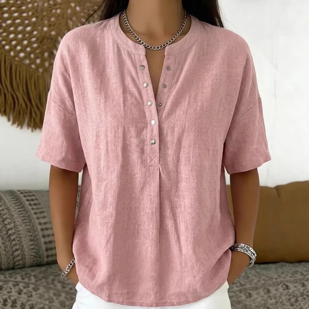 Women’s solid color loose-fit short-sleeve pullover top from Plush Fashion Hub, casualwear with a relaxed fit and simple style.