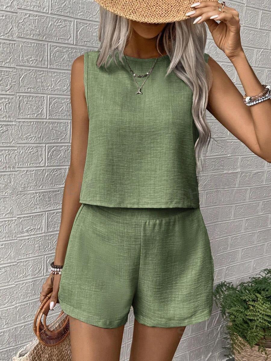 Women's solid color sleeveless vest and shorts set from Plush Fashion Hub, casualwear with a relaxed fit and stylish design.