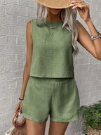 Women's solid color sleeveless vest and shorts set from Plush Fashion Hub, casualwear with a relaxed fit and stylish design.