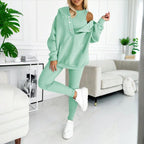 Women's solid color three-piece casualwear set by Plush Fashion Hub, featuring coordinated top, pants, and jacket in a neutral tone.