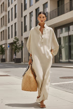 Women’s loose straight long dress with stand collar and button-down design, casualwear by Plush Fashion Hub.