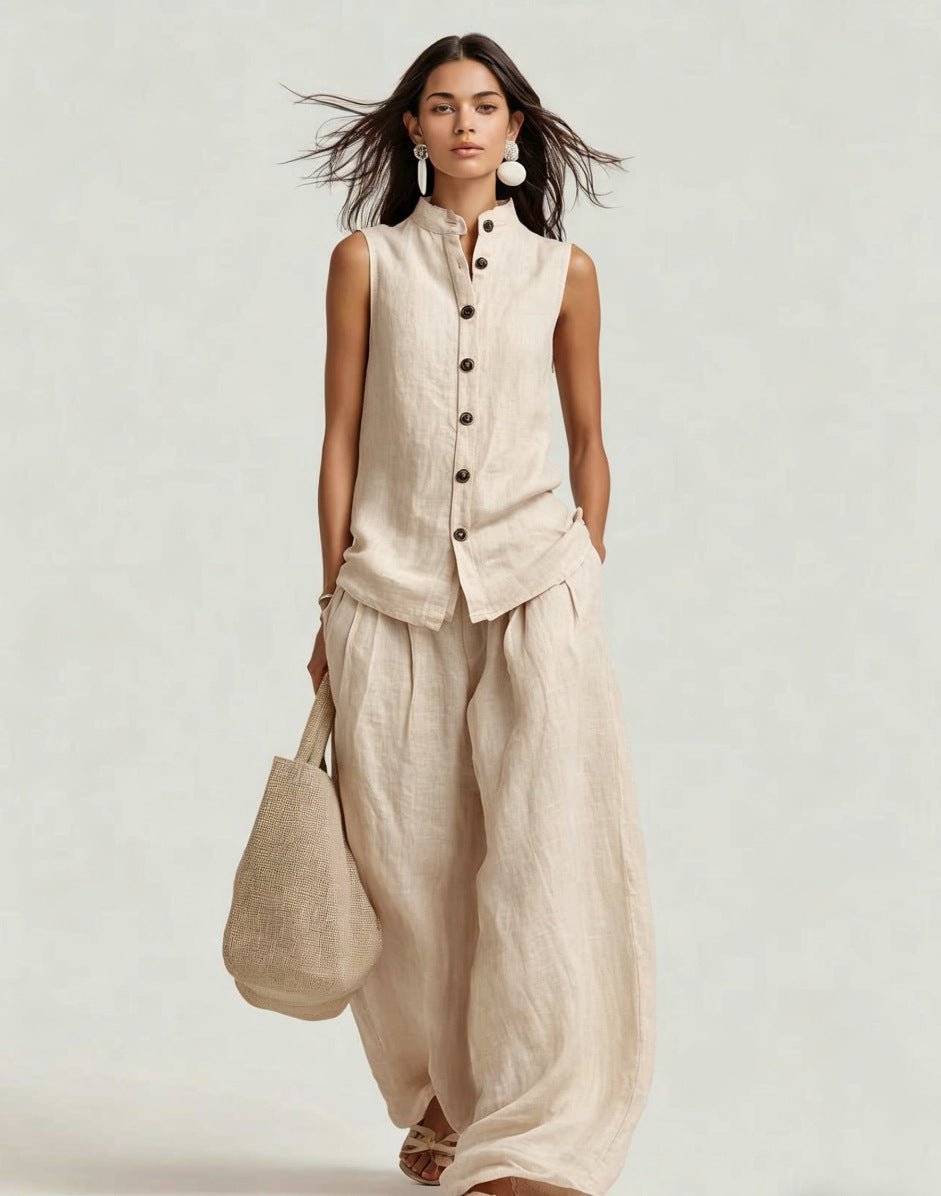 Women's sleeveless stand collar top and high-waist wide-leg pants set by Plush Fashion Hub, casualwear ensemble with stylish fit.