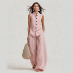 Women's sleeveless stand collar top and high-waist wide-leg pants set by Plush Fashion Hub, casualwear ensemble.