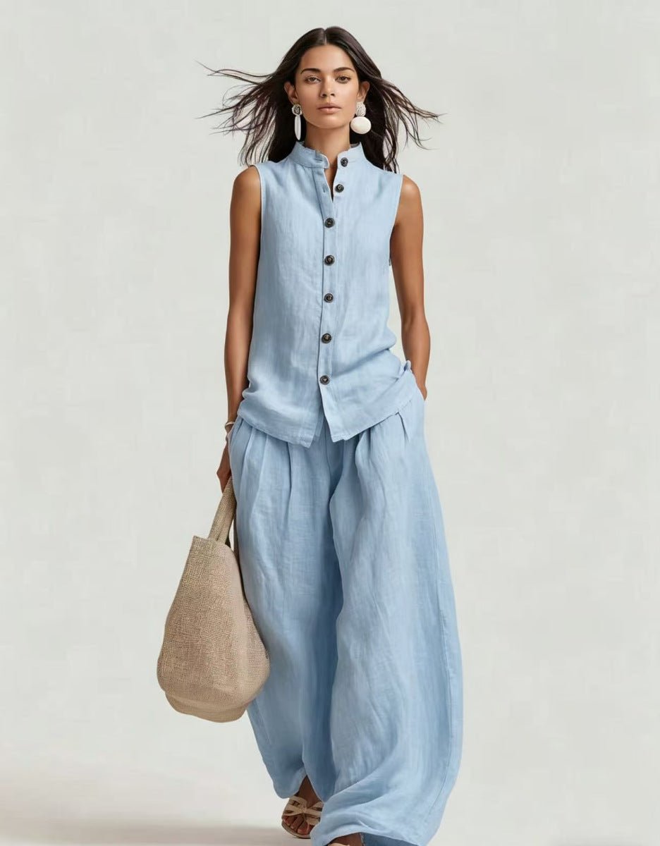 Women's sleeveless stand collar top and high-waist wide-leg pants set from Plush Fashion Hub, casualwear outfit, front view.