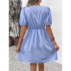 Women’s striped tie-front puff sleeve mini dress by Plush Fashion Hub, casualwear with stylish stripes and feminine puff sleeves.