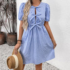 Women’s striped tie-front puff sleeve mini dress from Plush Fashion Hub, showing the casual style with a fitted waist and short sleeves.
