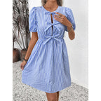 Women’s striped tie-front puff sleeve mini dress by Plush Fashion Hub, casualwear with a stylish front tie and puff sleeve design.