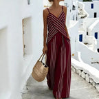 Women's striped V-neck sleeveless two-piece casualwear set by Plush Fashion Hub, featuring a relaxed fit and bold stripe pattern.
