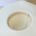 Women’s summer straw hat from Plush Fashion Hub with wide brim and woven design, perfect for sunny outdoor activities.