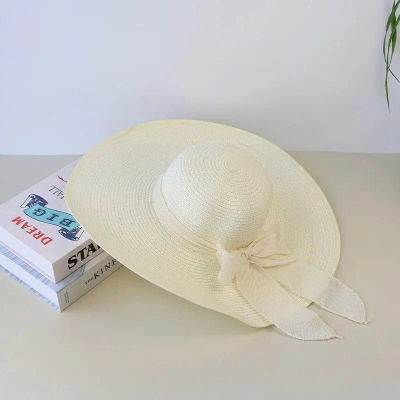 Women’s summer straw hat from Plush Fashion Hub with wide brim and breathable woven design, perfect for sunny outdoor days.