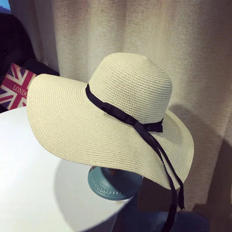Women’s summer straw hat from Plush Fashion Hub with a wide brim and woven design, perfect for sunny outdoor wear.