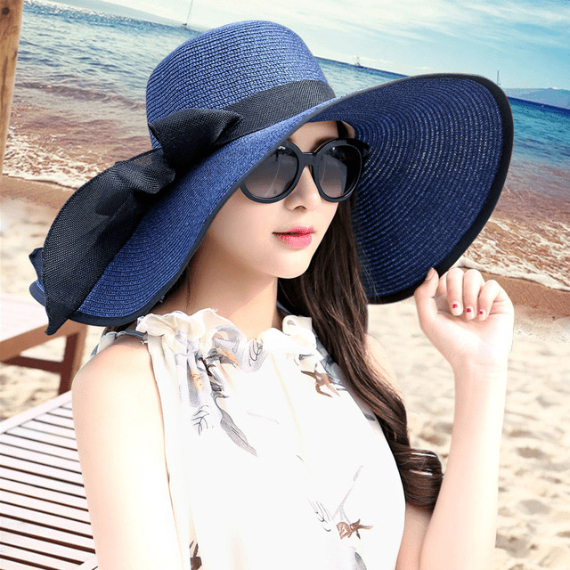 Women’s summer straw hat from Plush Fashion Hub, featuring wide brim and woven design for stylish sun protection.