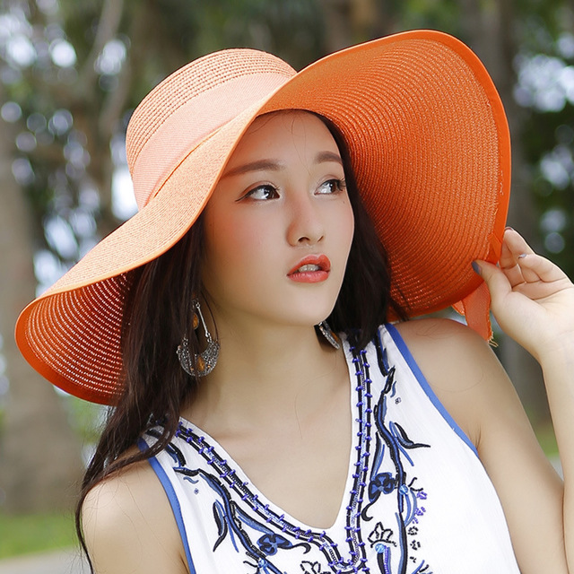 Women’s summer straw hat by Plush Fashion Hub featuring a wide brim and woven design for sun protection and stylish summer wear.