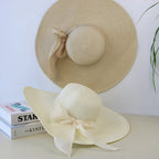 Women’s summer straw hat from Plush Fashion Hub featuring a wide brim and breathable design for sun protection and stylish summer wear.