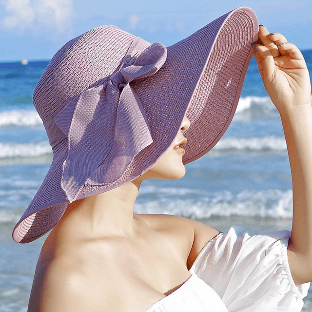 Women’s summer straw hat from Plush Fashion Hub with wide brim and woven design for sun protection and stylish outdoor wear.