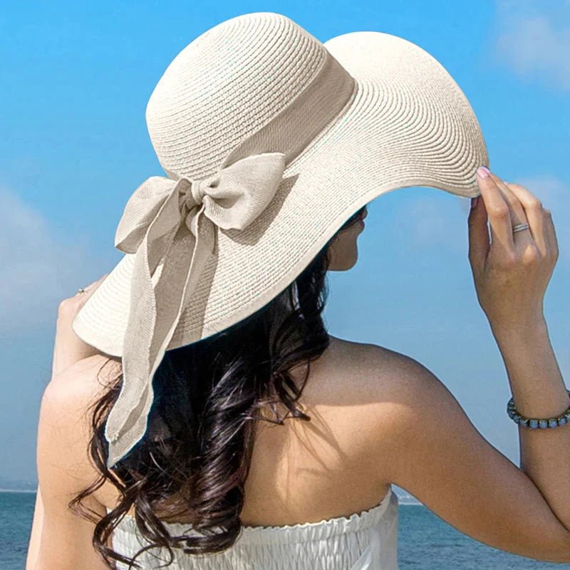 Women’s summer straw hat from Plush Fashion Hub, featuring wide brim and breathable woven design for sun protection.