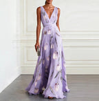 Women's tulip print sleeveless V-neck A-line maxi dress in 7 colors by Plush Fashion Hub, showcasing the flowing dress and vibrant pattern.