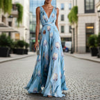 Women's tulip print sleeveless V-neck A-line maxi dress by Plush Fashion Hub available in 7 colors, shown in a stylish floral pattern.