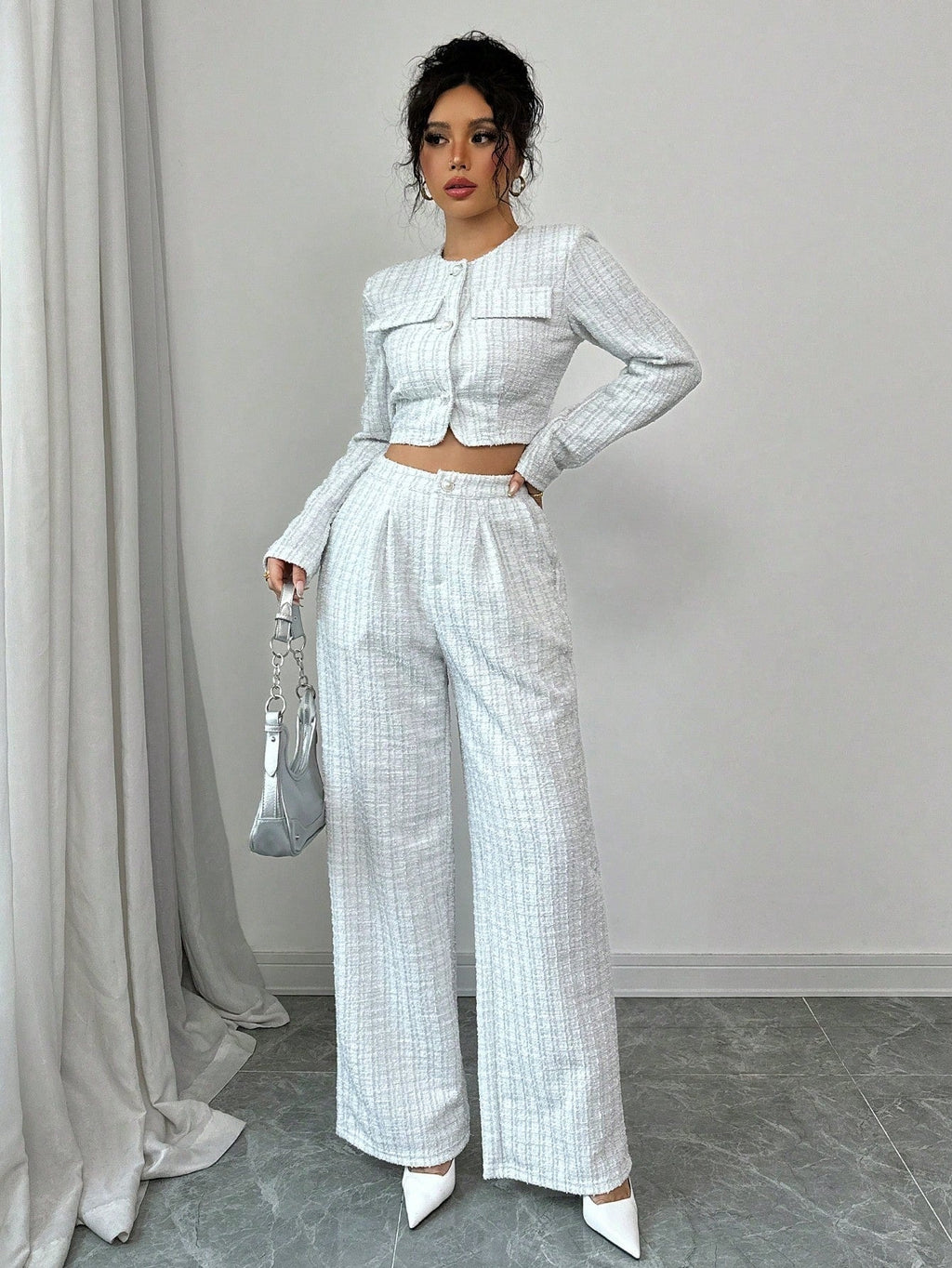 Women’s tweed pearl-button jacket and pants set, casualwear by Plush Fashion Hub, featuring a stylish tailored look and textured fabric.