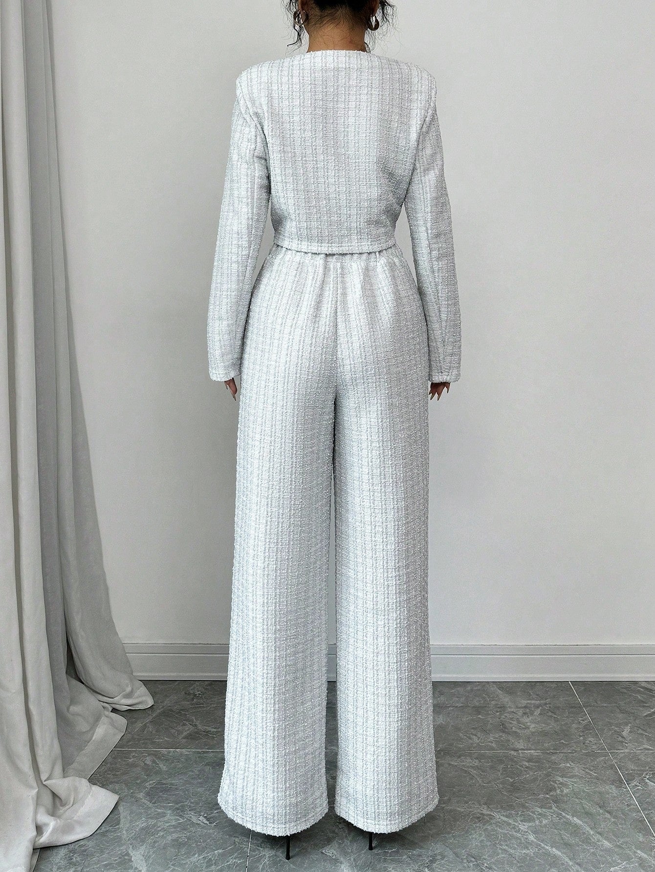 Women’s tweed pearl-button jacket and pants set by Plush Fashion Hub, casualwear ensemble with stylish tailored fit and classic design.