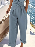 Plus size women's twist-front V-neck lounge set with pockets by Plush Fashion Hub, featuring comfortable fabric and stylish design.