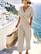 Plus size women's twist-front V-neck lounge set with pockets by Plush Fashion Hub, featuring comfortable, stylish casual clothing.