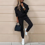 Women's solid color hooded sweatshirt set by Plush Fashion Hub, casualwear with a relaxed fit and comfortable hoodie design.
