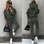 Women's two-piece solid color hooded sweatshirt set by Plush Fashion Hub, featuring a casual hoodie and matching sweatpants.
