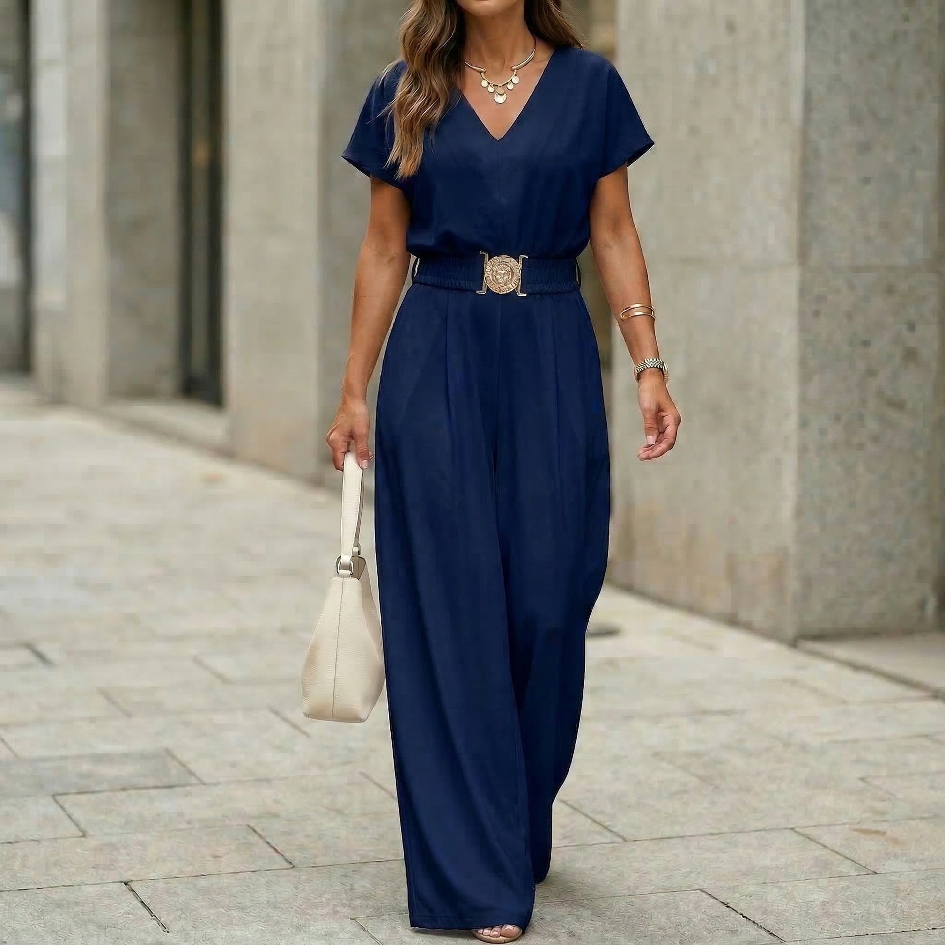 Women's V-neck belted wide-leg jumpsuit in casualwear style, featuring a comfortable fit and stylish design by Plush Fashion Hub.