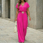 Women's V-neck belted wide-leg jumpsuit from Plush Fashion Hub, casualwear with a stylish V-neck and comfortable wide-leg design.