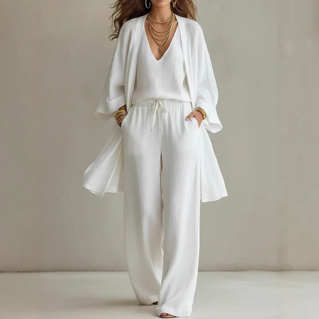 Women's V-neck cardigan coat, pocket vest, and long pants casualwear three-piece set by Plush Fashion Hub, displayed on a model.