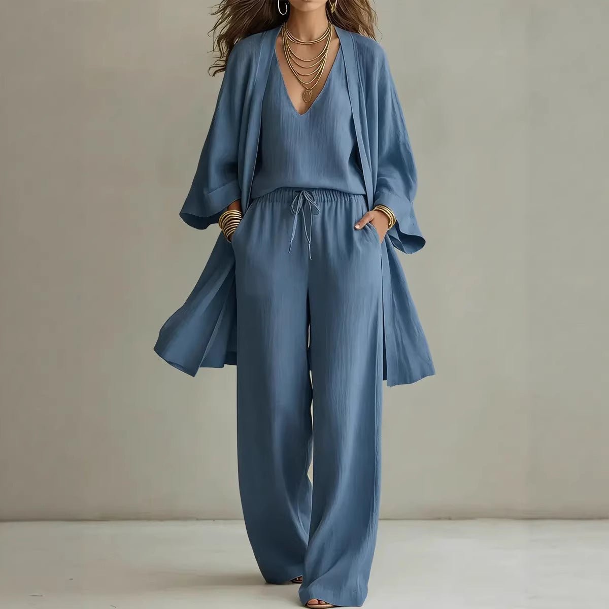 Women's casual V-neck cardigan coat, pocket vest, and long pants three-piece set by Plush Fashion Hub, displayed on a model.