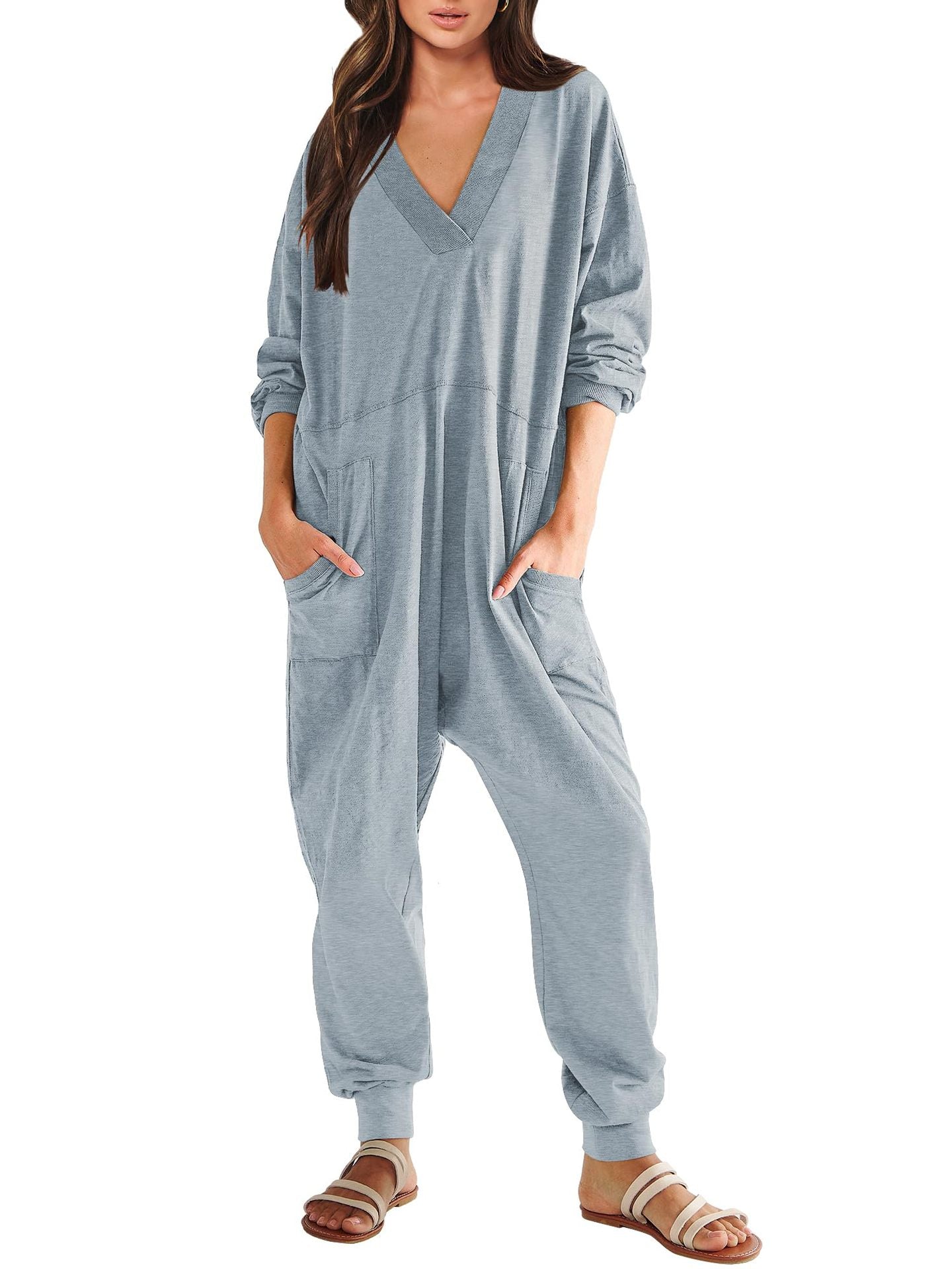Women's V-neck long sleeve solid color loose jumpsuit with two side pockets, casualwear by Plush Fashion Hub.