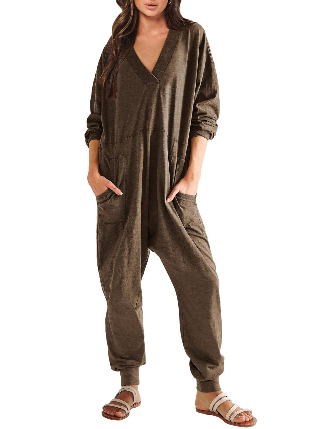 Women’s V-neck long sleeve solid color loose jumpsuit with two side pockets, casual wear by Plush Fashion Hub.