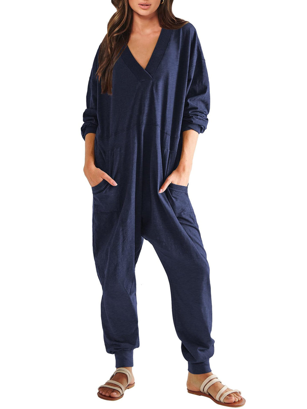 Women’s V-neck long sleeve solid color loose jumpsuit with two side pockets, casualwear by Plush Fashion Hub.
