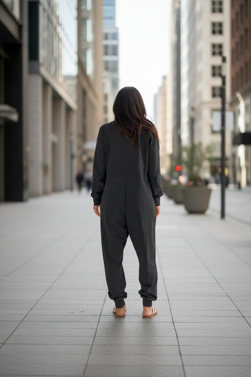 Women’s V-neck long sleeve solid color loose jumpsuit with two side pockets, casualwear by Plush Fashion Hub.