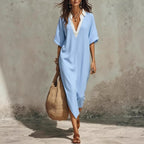 Women's V-neck loose linen midi dress with cropped sleeves and pockets, casualwear by Plush Fashion Hub.
