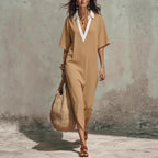 Women's V-neck loose linen midi dress with cropped sleeves and pockets, casualwear by Plush Fashion Hub.